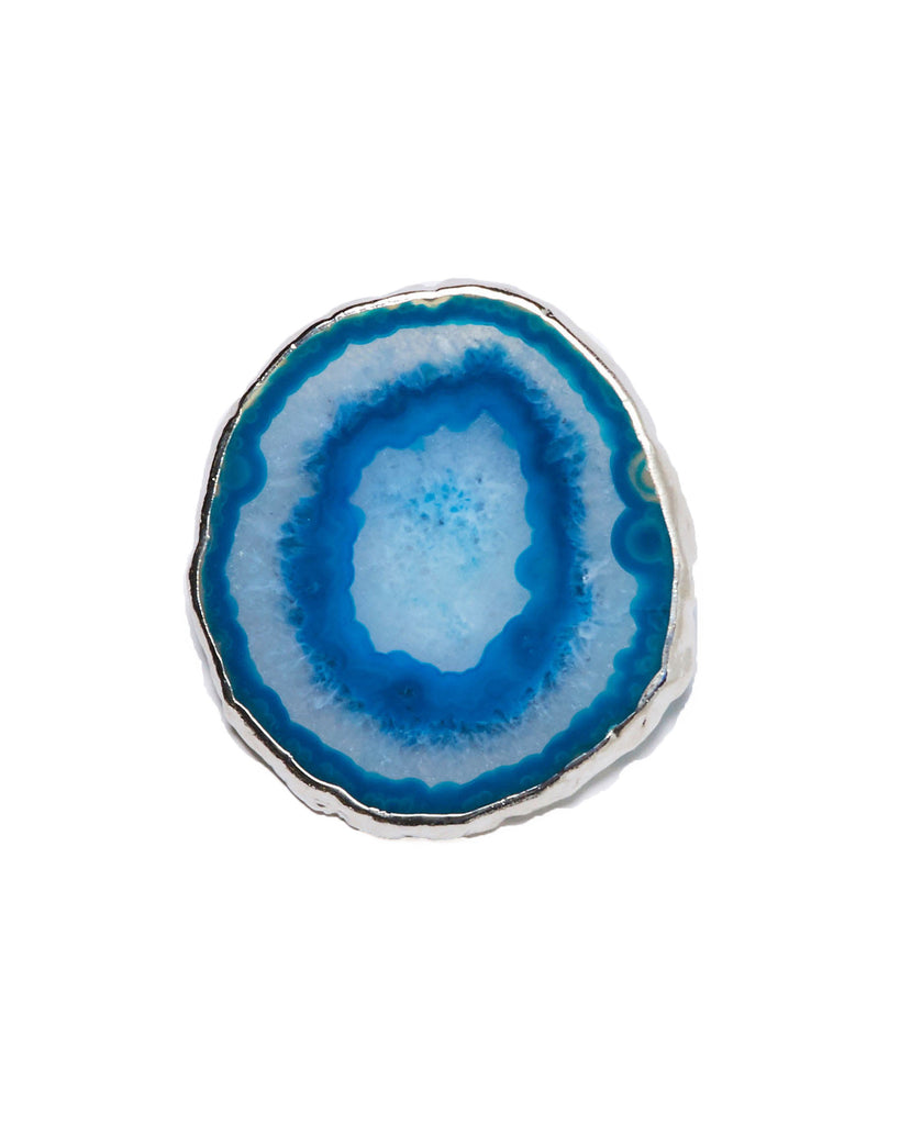 Silver plated agate crystal coaster.  Our natural crystal coasters are the perfect addition to your dining room or coffee table. With natural blue agate from Brazil, coated in silver plating, this coaster is an easy way to elevate the luxury in your home.  Blue Agate Crystal  100-120mm  Silver Plating  Please note: Due to our crystals being 100% natural, shape and colour patterns will vary.